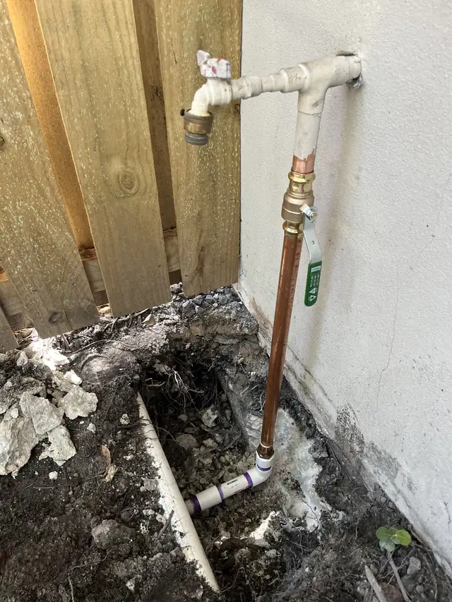 Exterior hose bib with a new shutoff valve and copper supply line after repair by Tier One