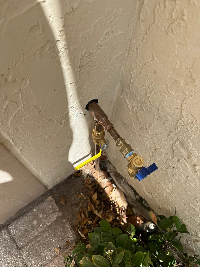 Residential exterior plumbing connections and shutoff valves serviced by Tier One